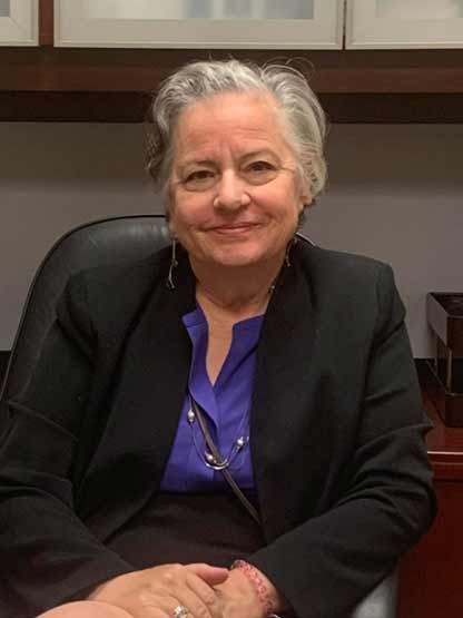 Rebecca Boxall at her desk in Arlington Texas